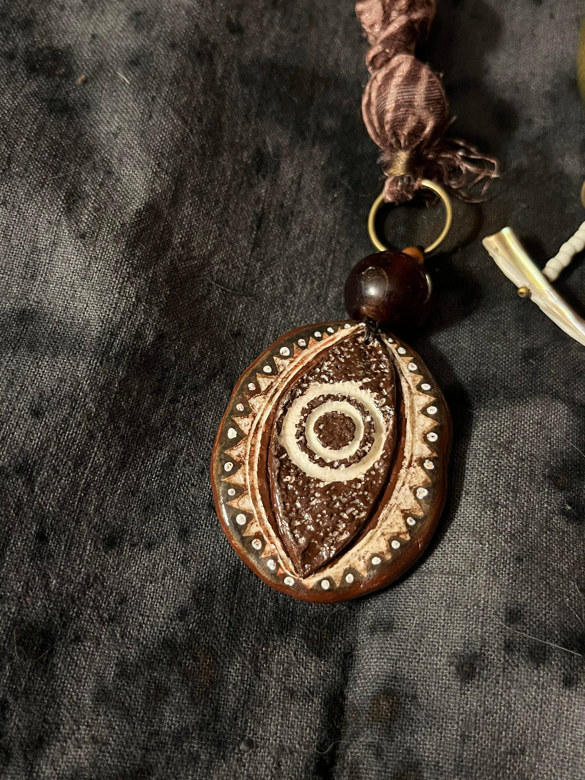 Tribal Hand-Painted Totem Shell & Stone Necklace – Ancient Wisdom, Worn」