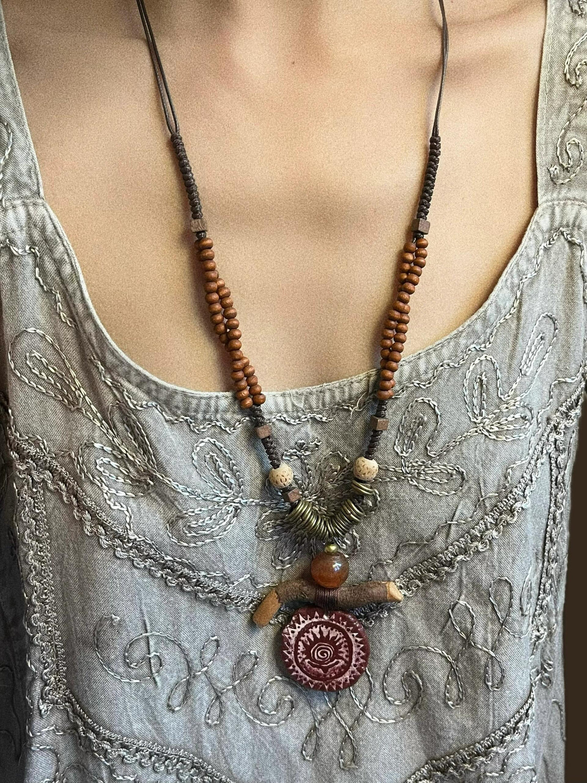 Tribal Spirit Hand-Painted Wood Necklace – Artisan Woven Statement Piece